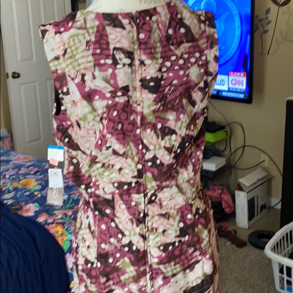 Knee length zippered back floral dress.